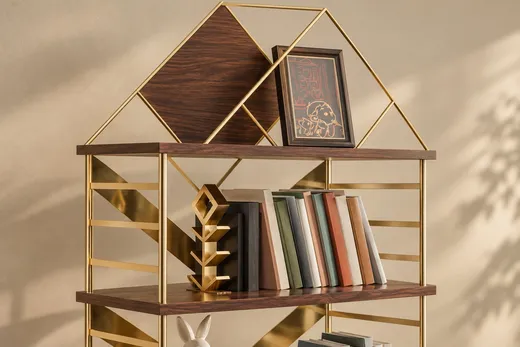 Close up of the bookcase with the diamond walnut panel and the branching brass motif