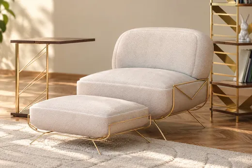 Lounge chair with ottoman in off white fabric on a brass frame